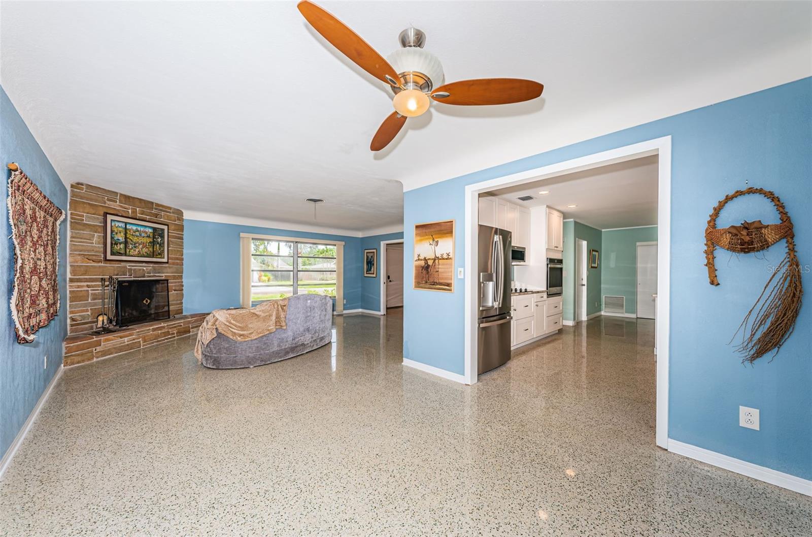 Dining area just off of kitchen and living room. Overlooks the serene backyard.