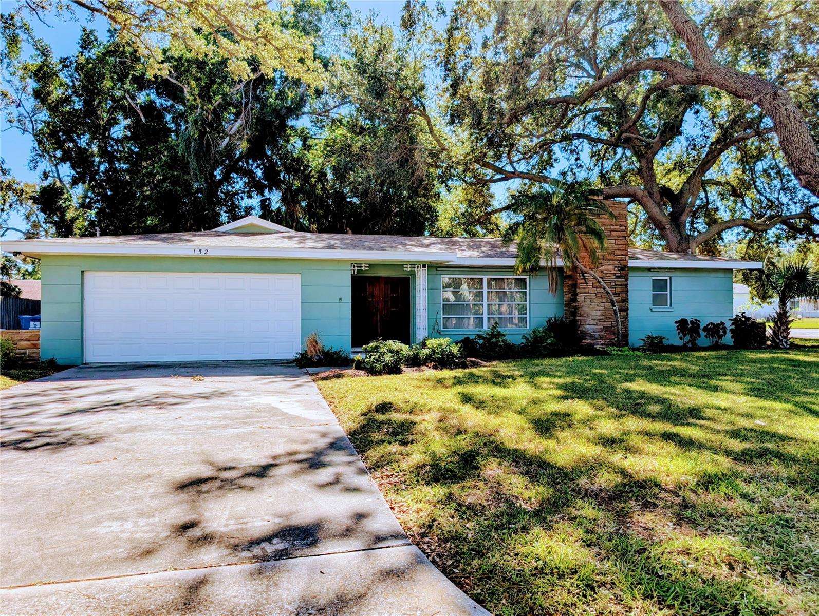 Mid Century terrazzo dream home on huge corner lot.