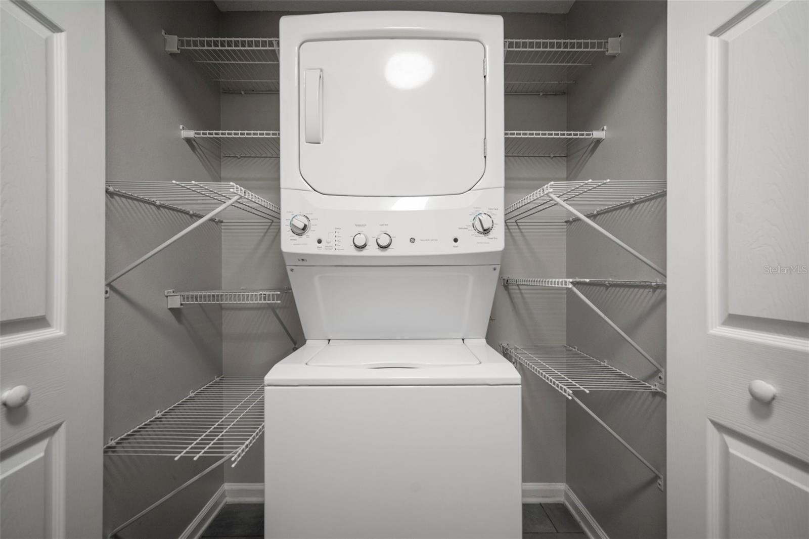 Laundry closet with added shelving