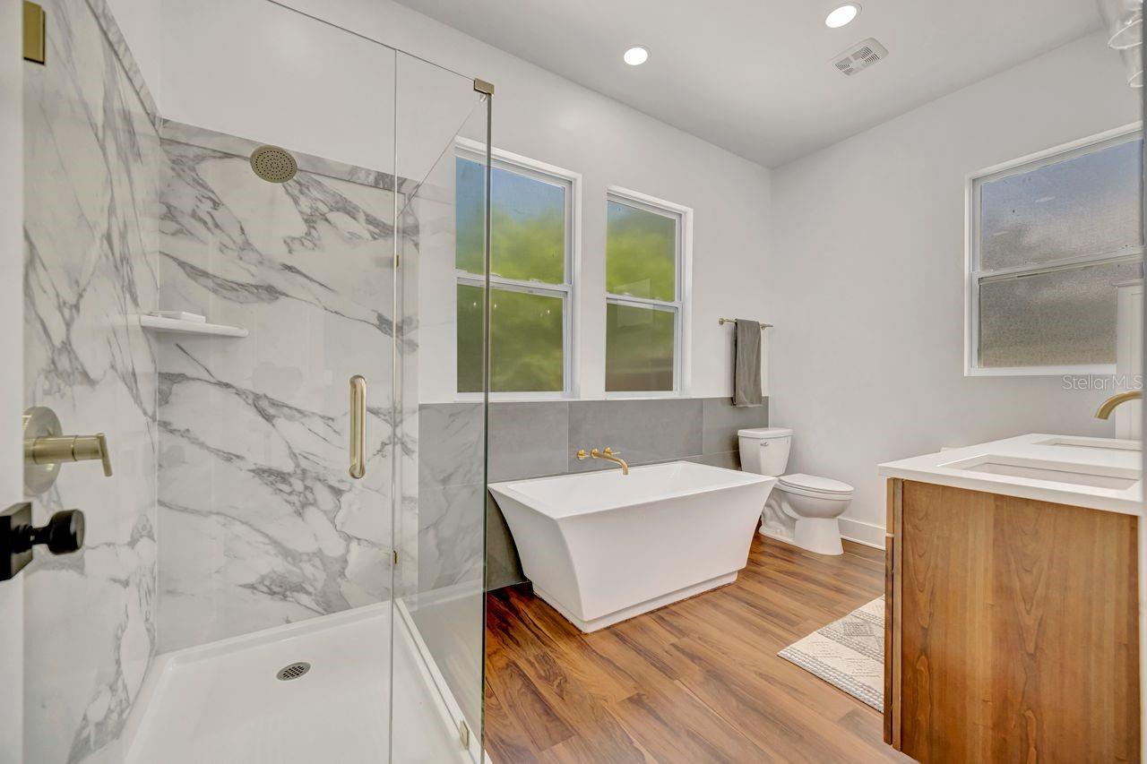 Elegant primary bath with lots of natural light