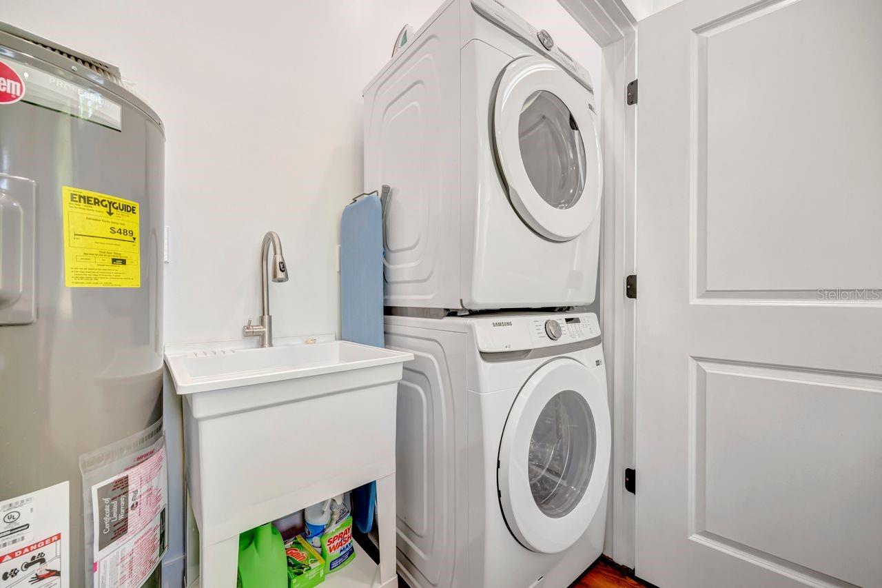 Utility closet with wash sink