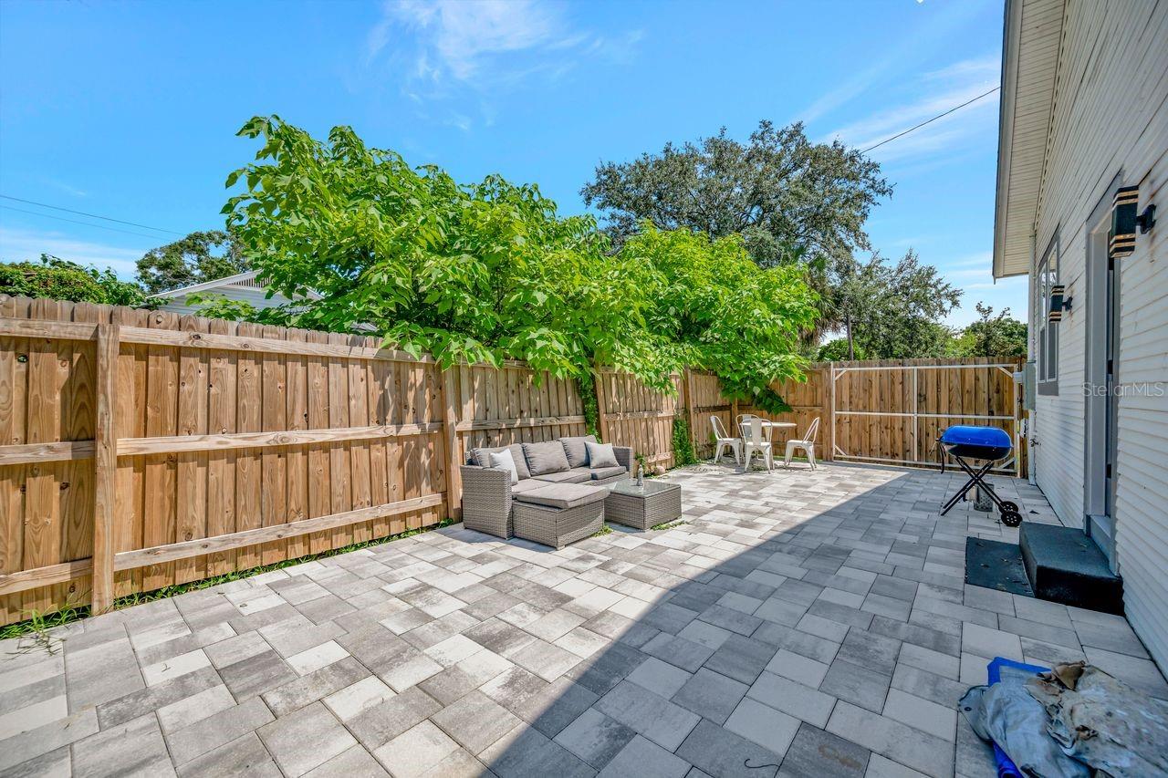 Private entertainment space with pavers