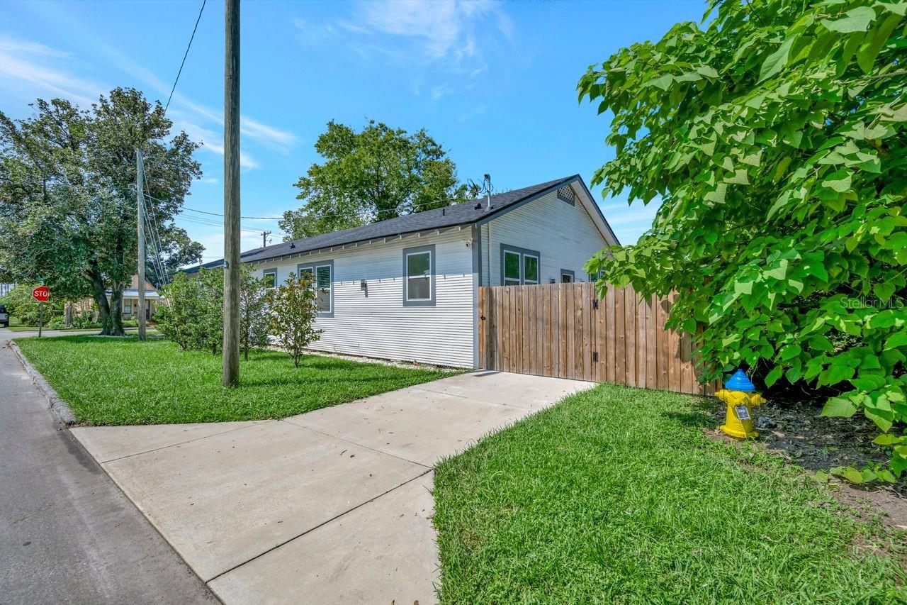Concrete driveway on side of home