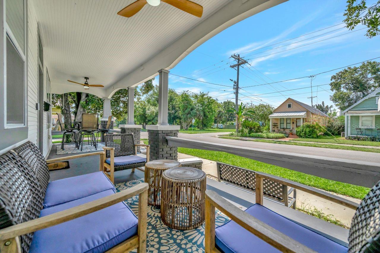 Wide front porch with double fans