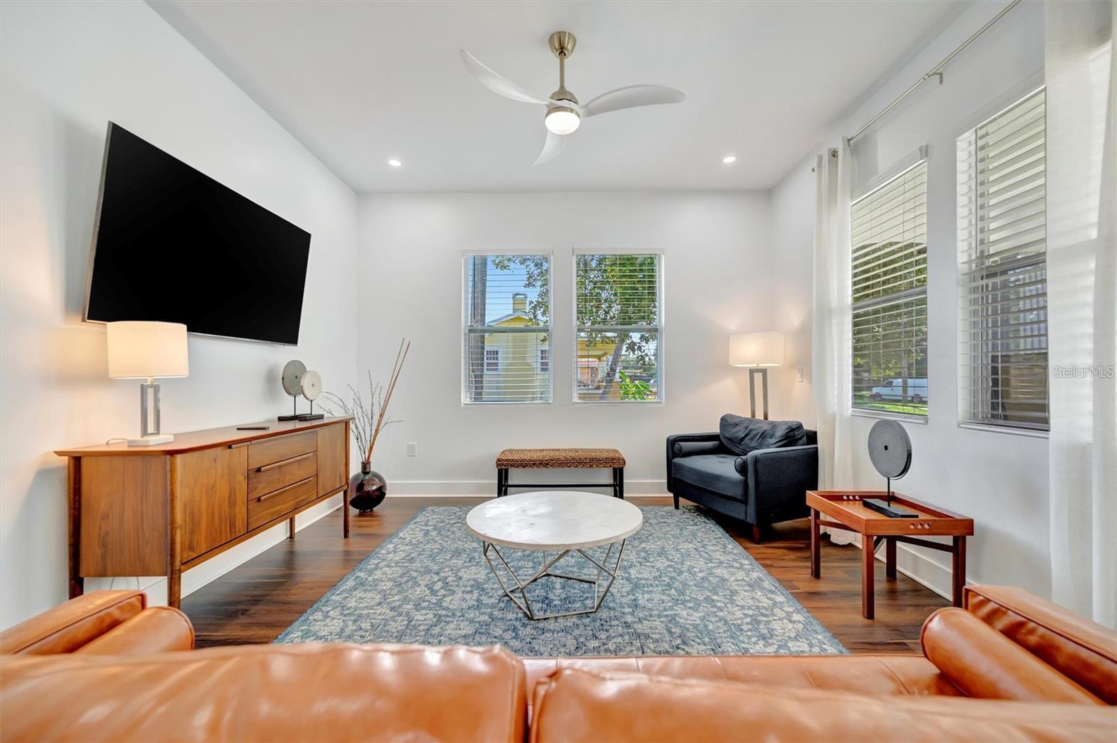 High ceilings, recessed lighting and lots of natural light