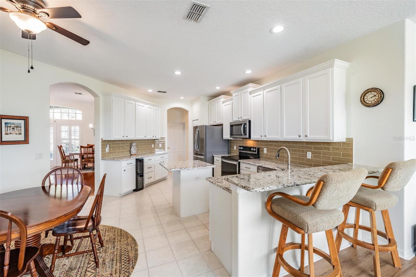 An eat in area along with breakfast bar seating