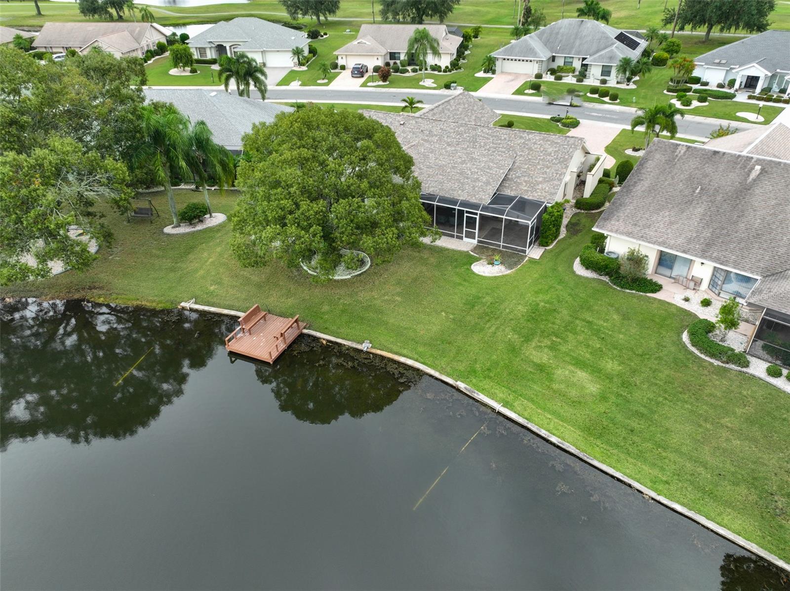 Lovely Green Space in Backyard and Dock View