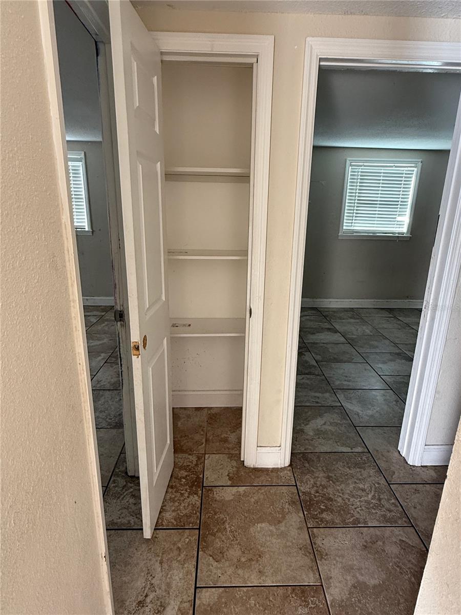 smaller linen closet between rooms