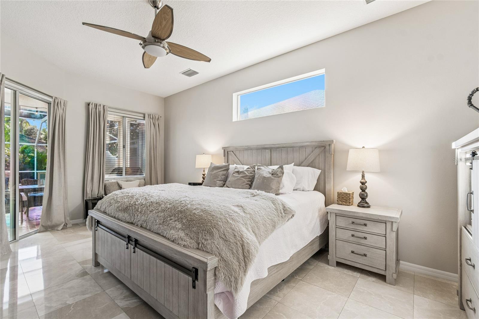 Primary bedroom --  Private access to pool area