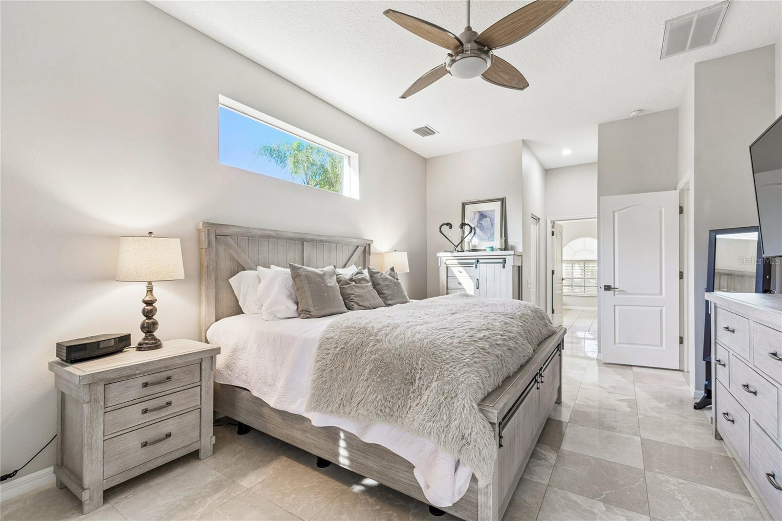 Primary bedroom -- Marble flooring