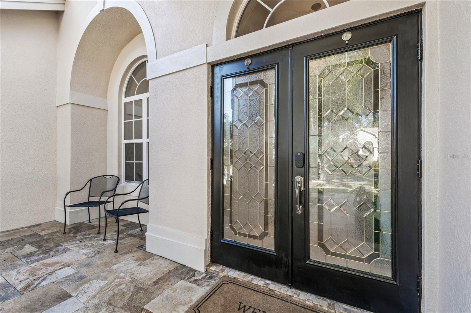 Front entry with double etched glass front doors