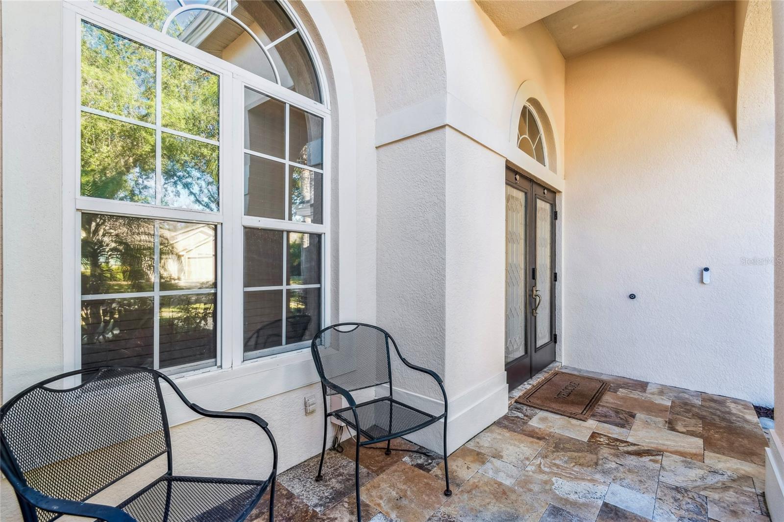 Front entry with travertine flooring