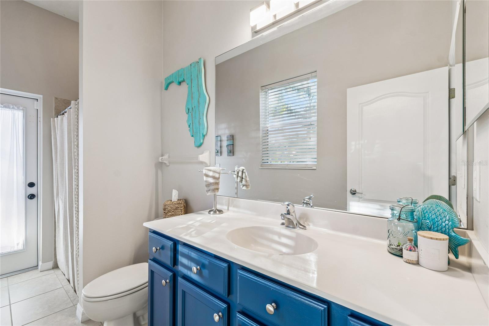 Third bathroom/Pool bathroom with access to pool area