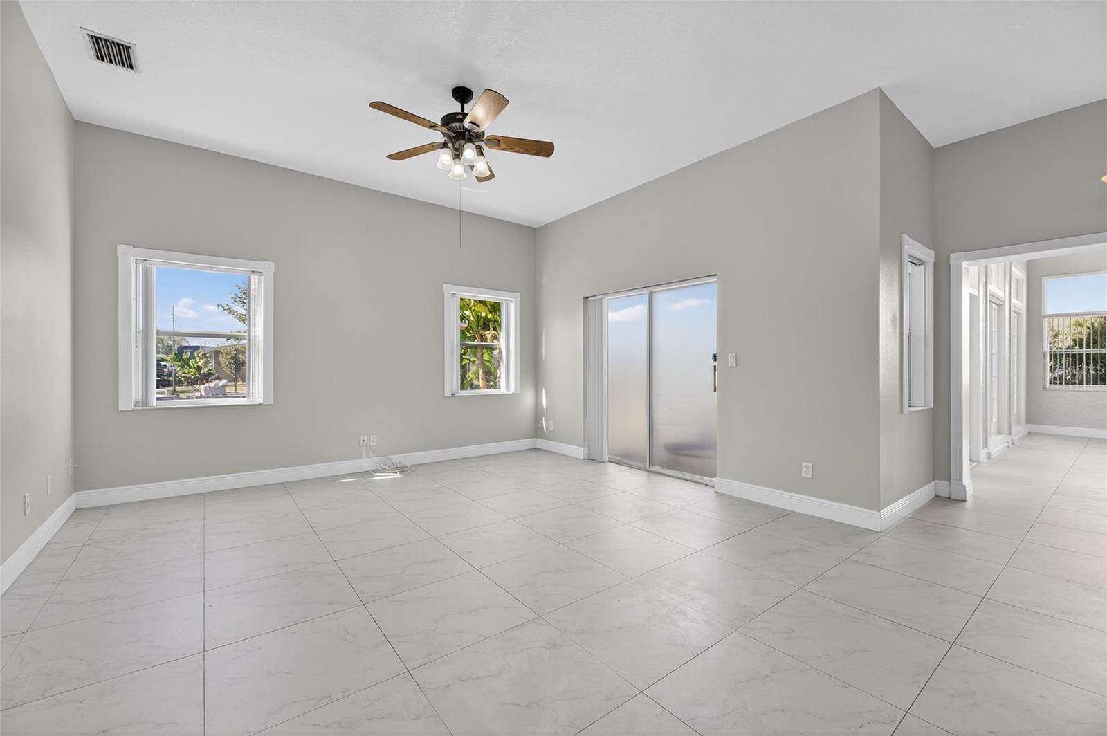 The family room with a sliding glass door.