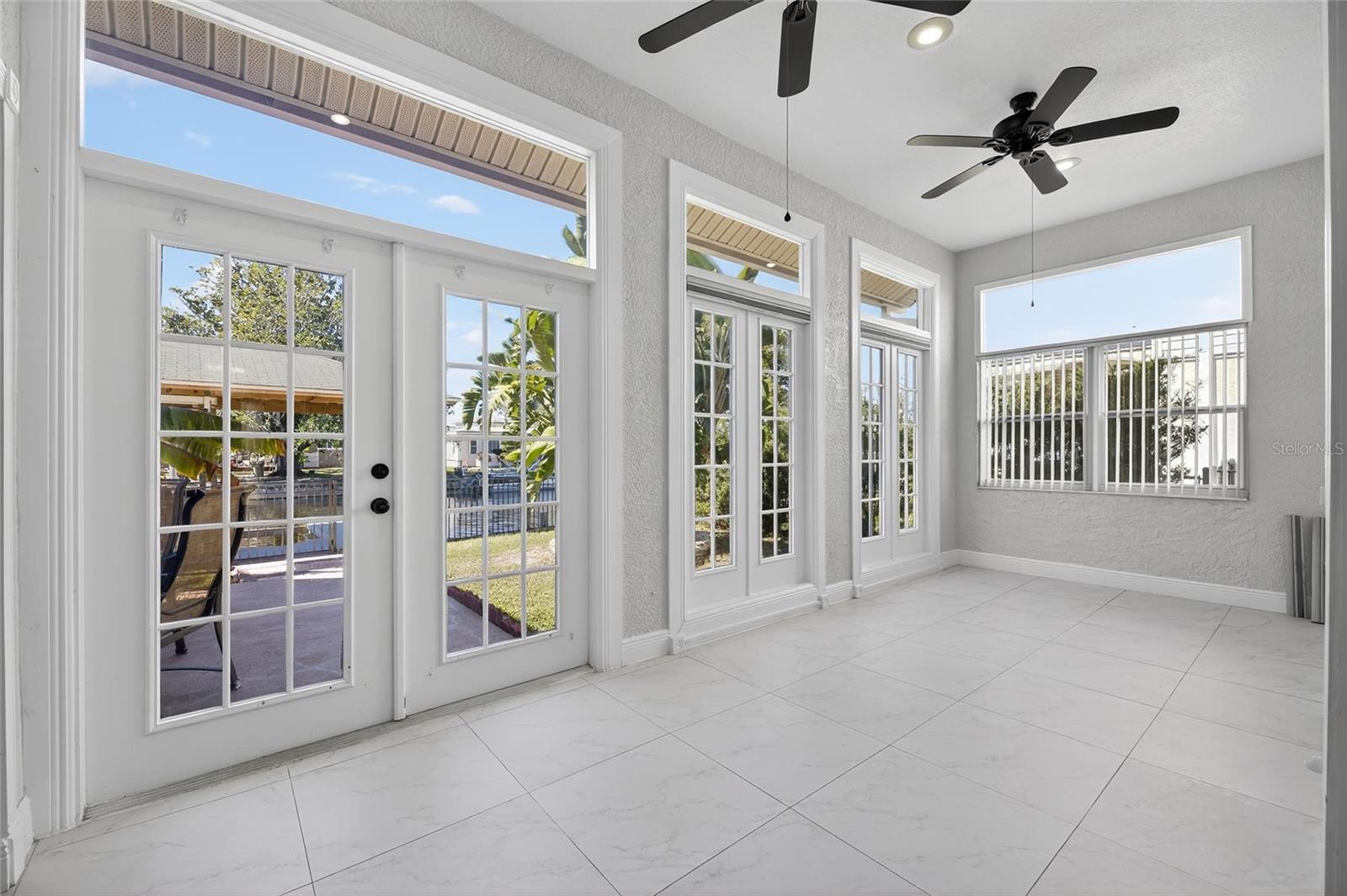 Florida room with large views and French doors
