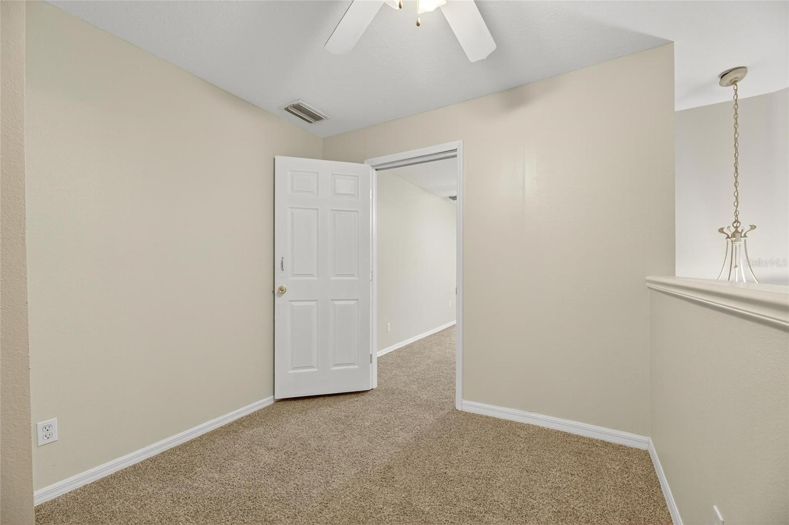 Loft area looking into bonus room