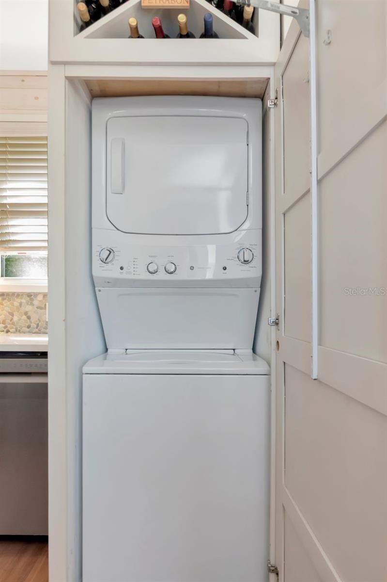 Washer and dryer. But laundry before wine.