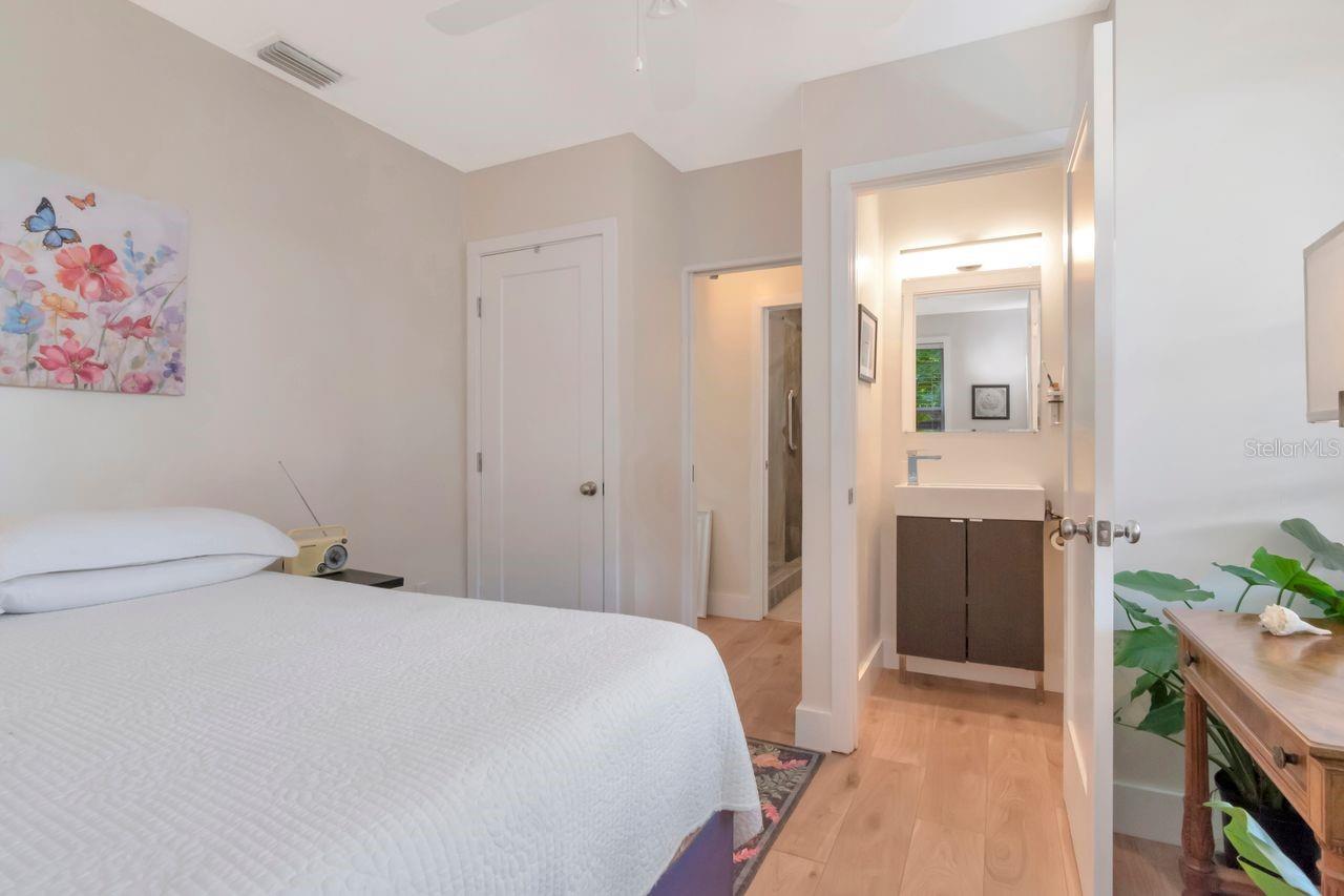 Guest bedroom with attached 1/2 bath.