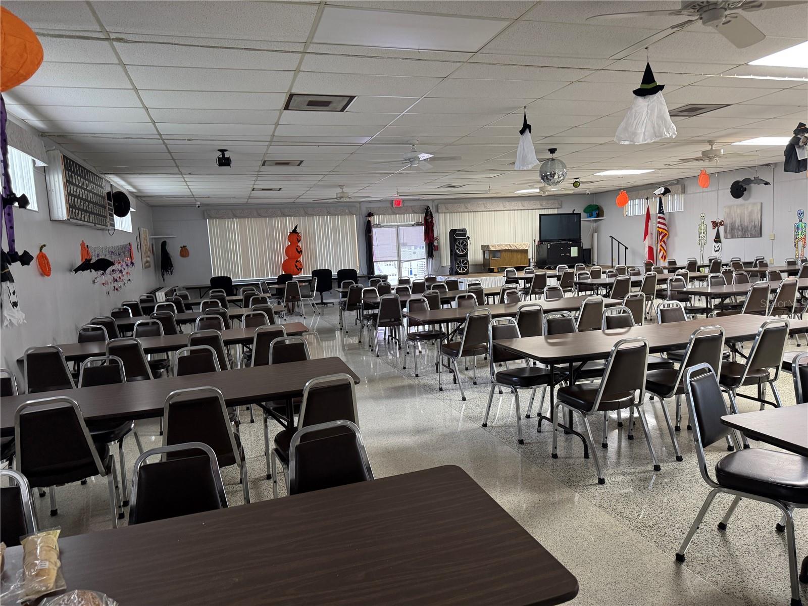 This shows how spacious this entertainment room is.  The doors lead out to the pool area.