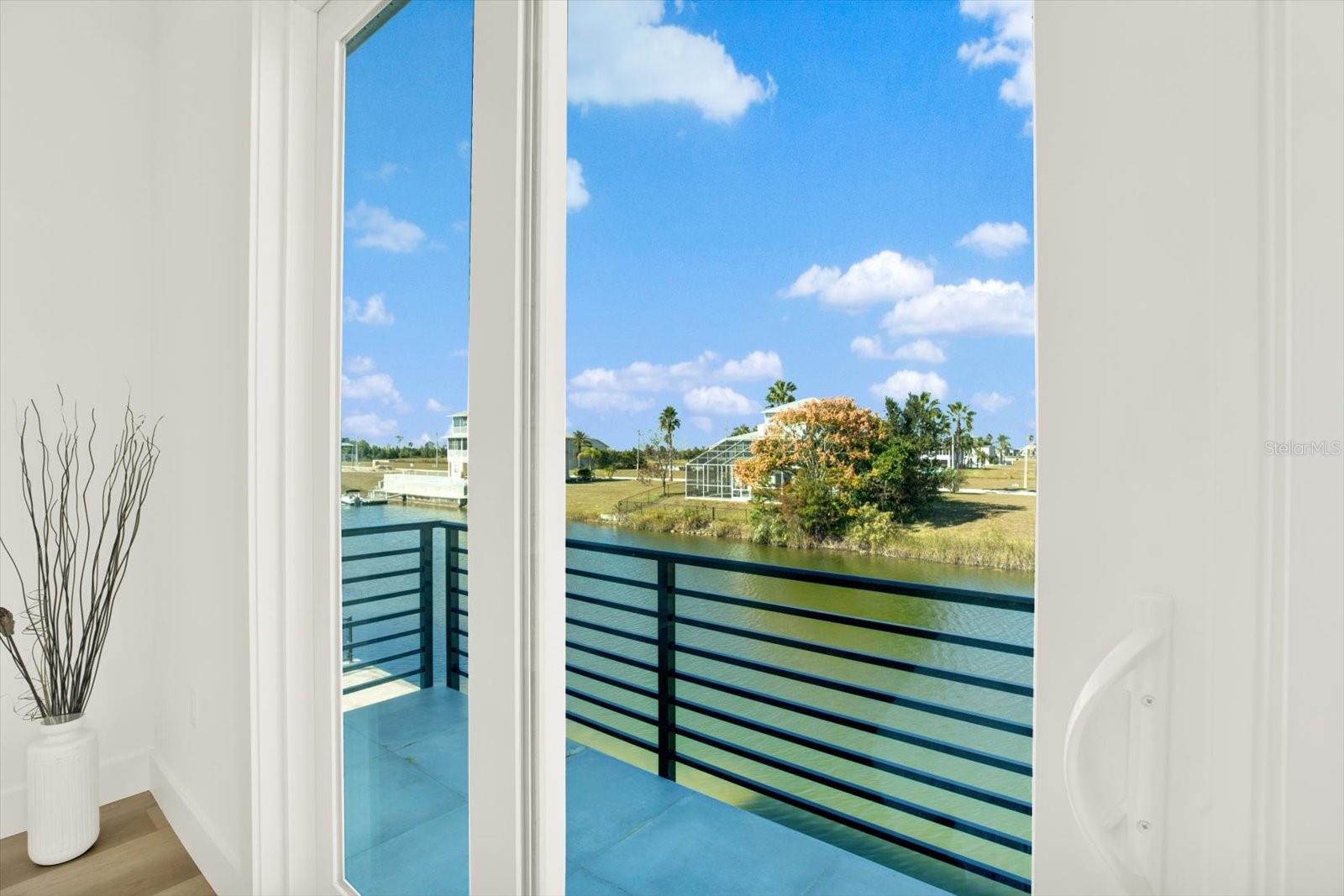 Primary Bedroom French Doors to Patio
