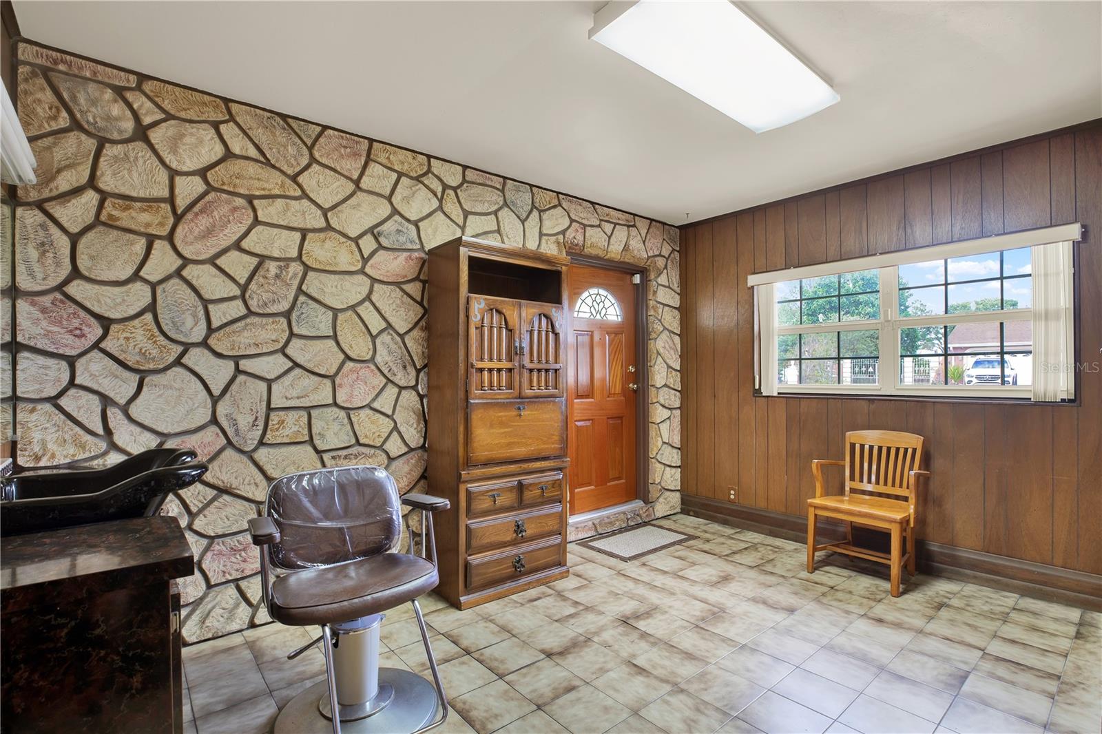 A flexible bonus room with a private entry from the outside, provides the perfect setup for a home workspace, craft area, or cozy guest space — adaptable to your lifestyle.