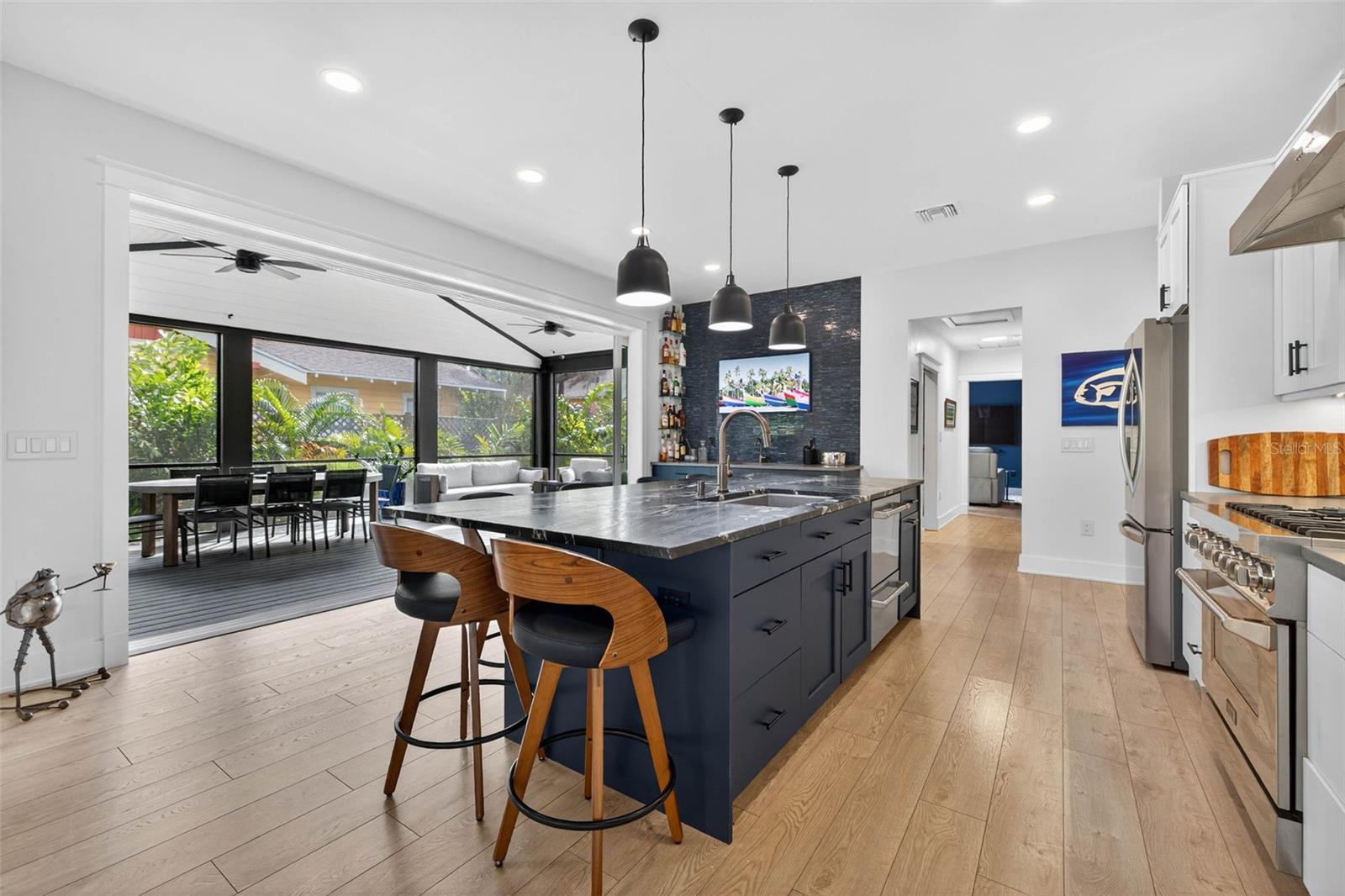 Four 9' Glass Panel Sliding Doors for Indoor/Outdoor Living