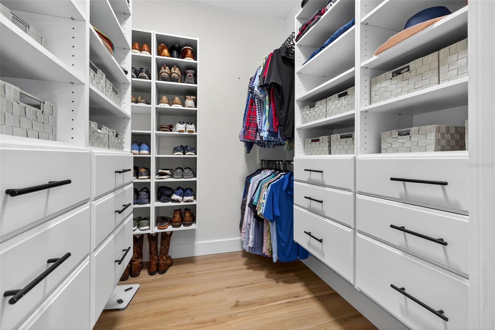 Custom Walk-In Closet with California Style Cabinetry