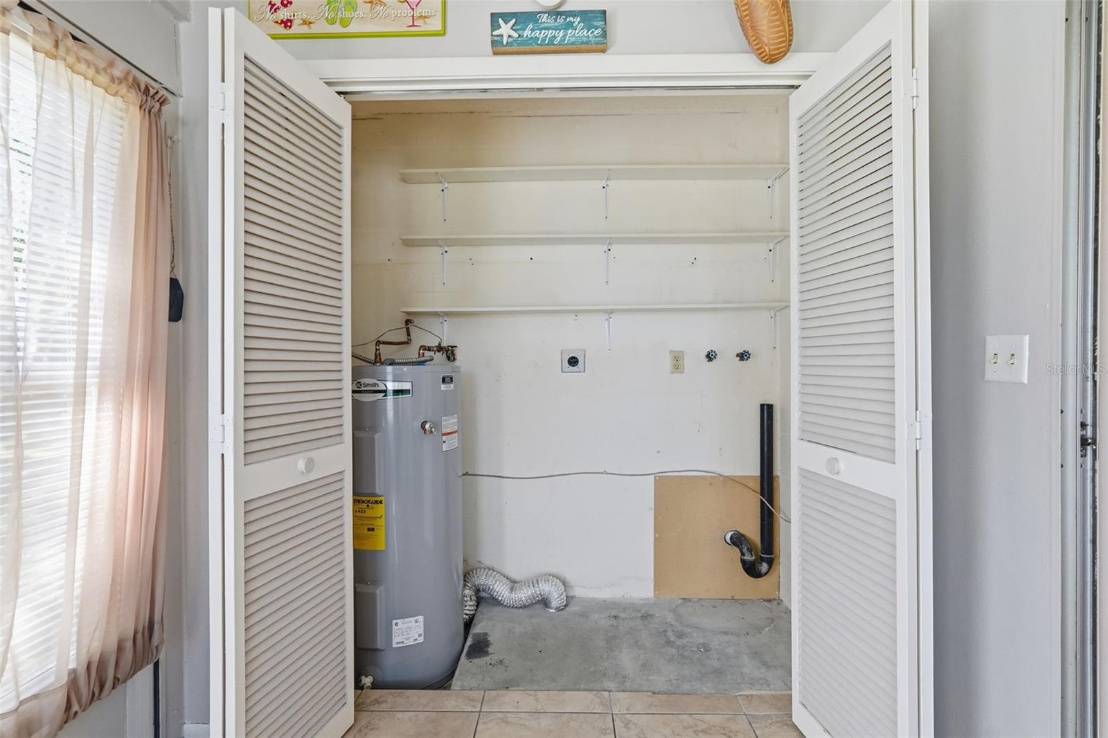 Washer and dryer closet in enclosed lanai