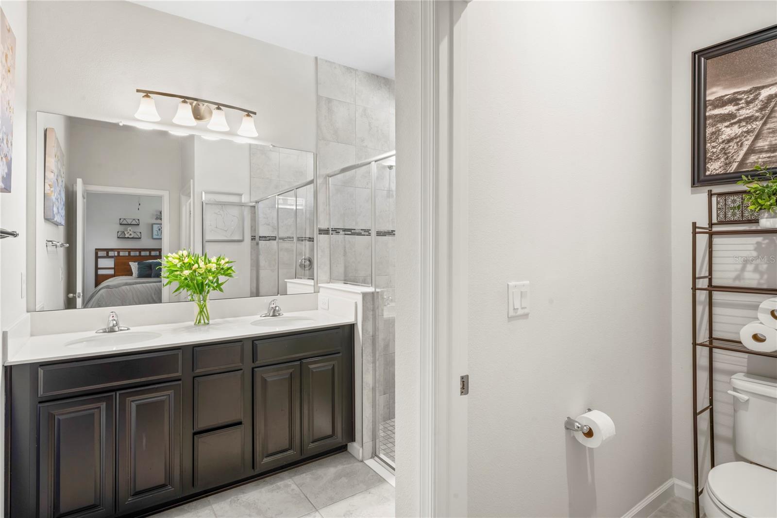 Primary bath with Double sinks and walk in shower.