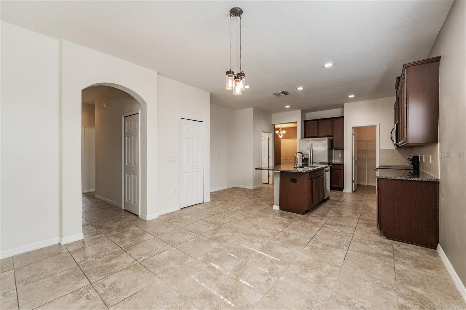 Kitchen - lots of counter top space and cabinets for storage, along with a pantry, Stainless Steel Appliances