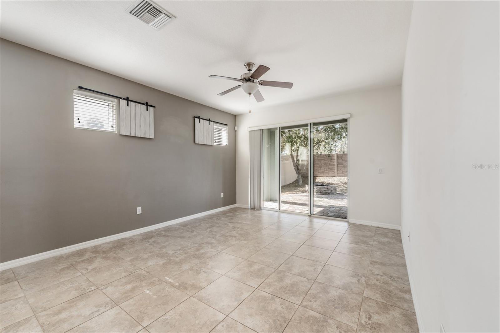 Family Room - open to the kitchen and back patio - Ceiling Fan with light fixture