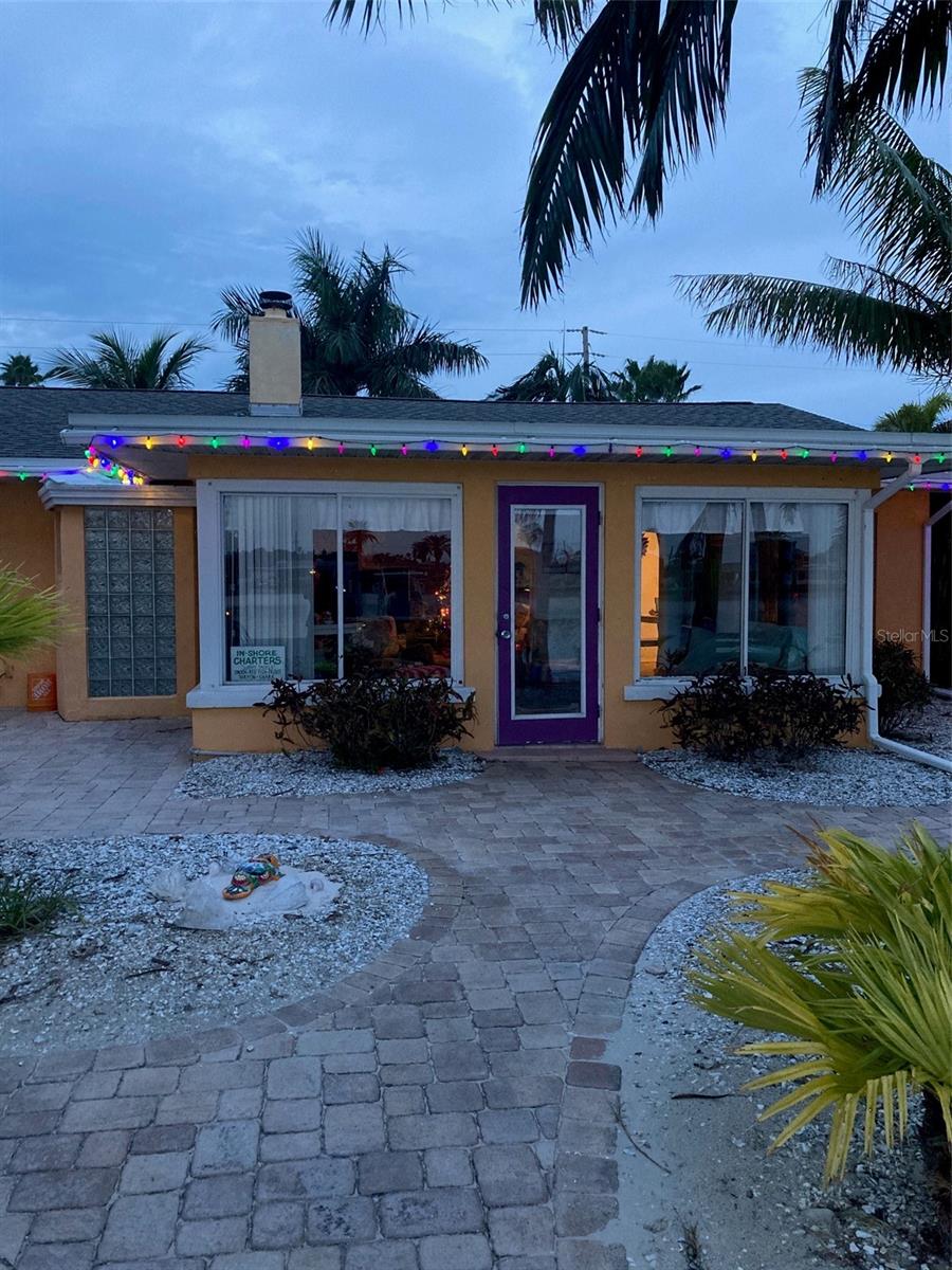 view of back door from sea wall