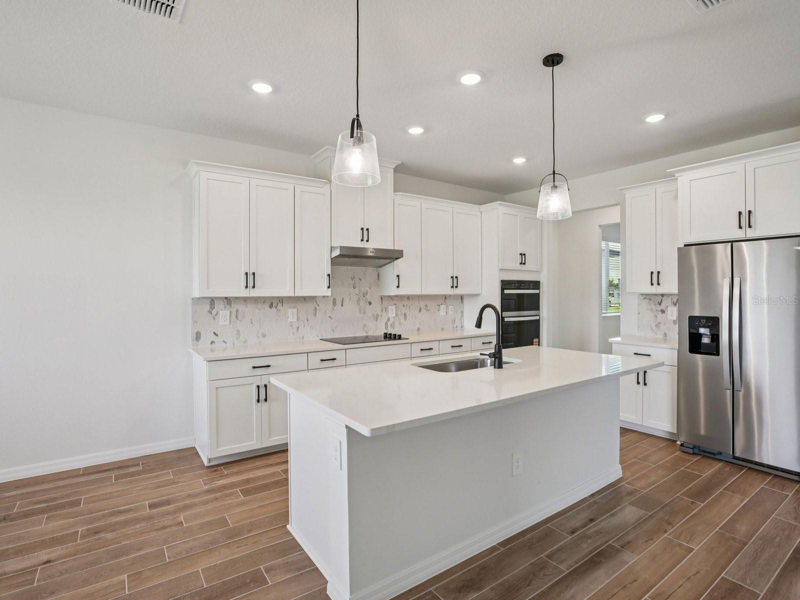 Interior photos are not of the actual home but are photos of the builder home with same floorplan with similar interior finishes and features.