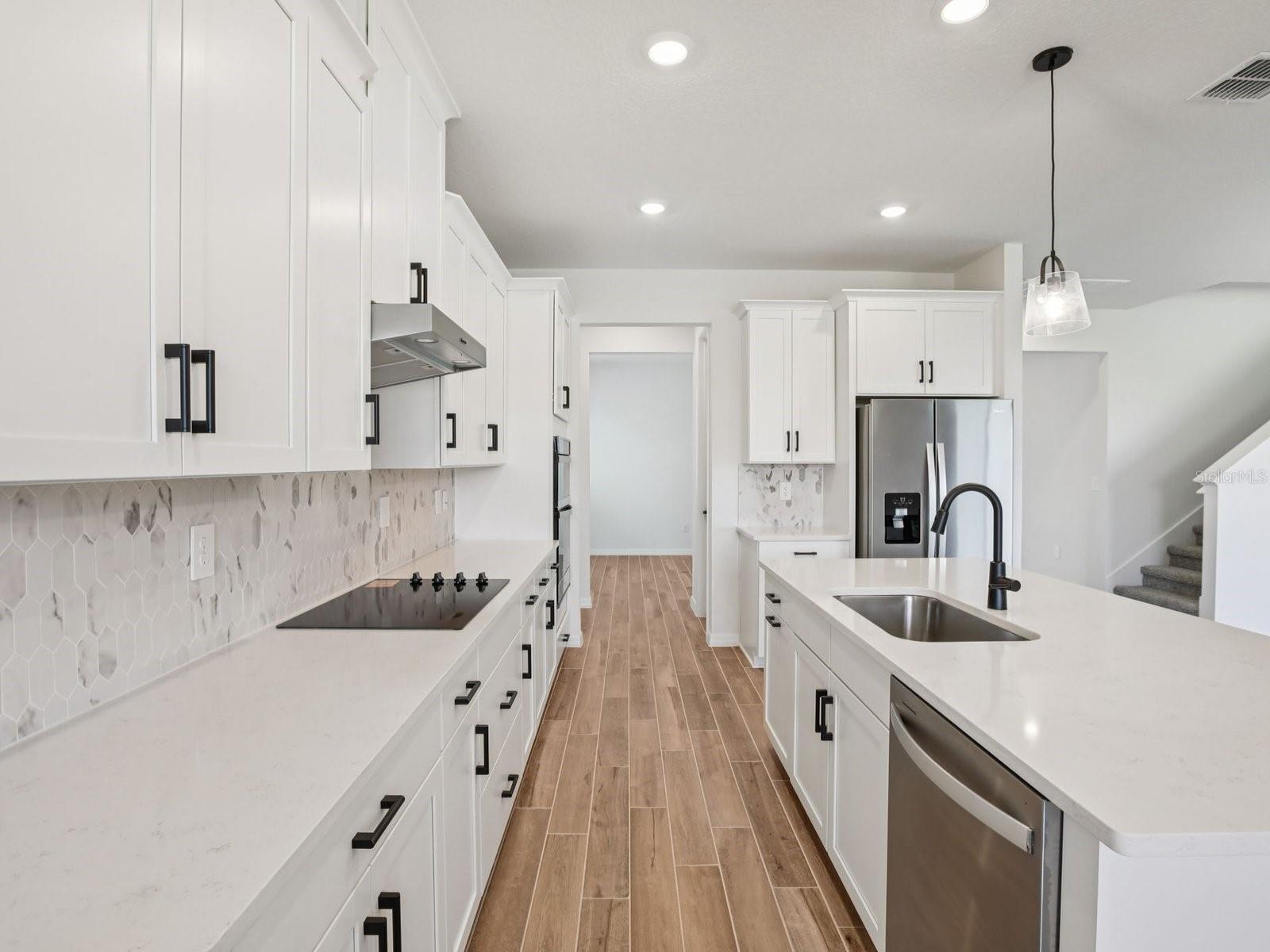 Interior photos are not of the actual home but are photos of the builder home with same floorplan with similar interior finishes and features.