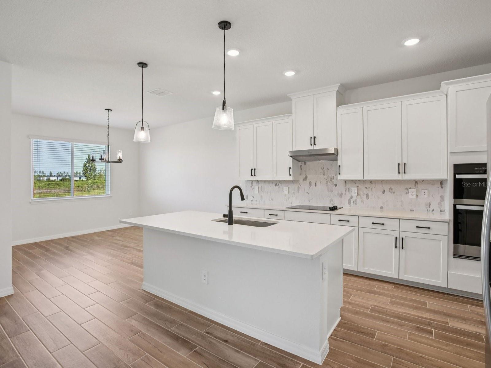 Interior photos are not of the actual home but are photos of the builder home with same floorplan with similar interior finishes and features.