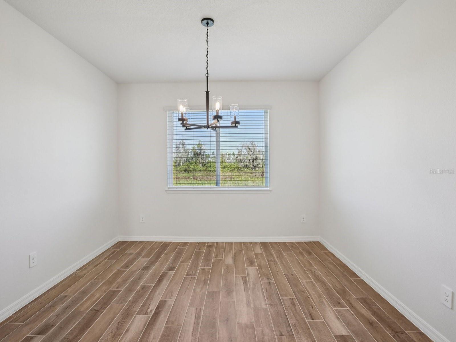 Interior photos are not of the actual home but are photos of the builder home with same floorplan with similar interior finishes and features.