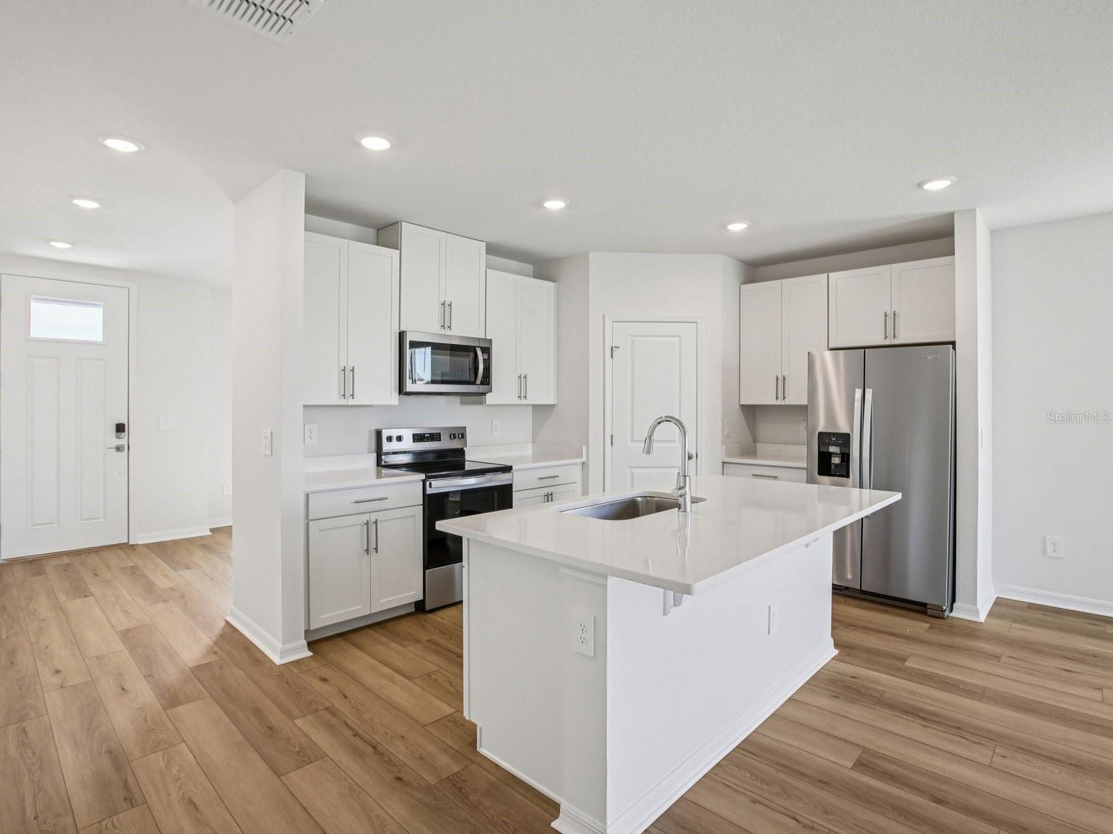 Interior photos are not of the actual home but are photos of the builder home with the same floorplan with similar interior finishes and features.