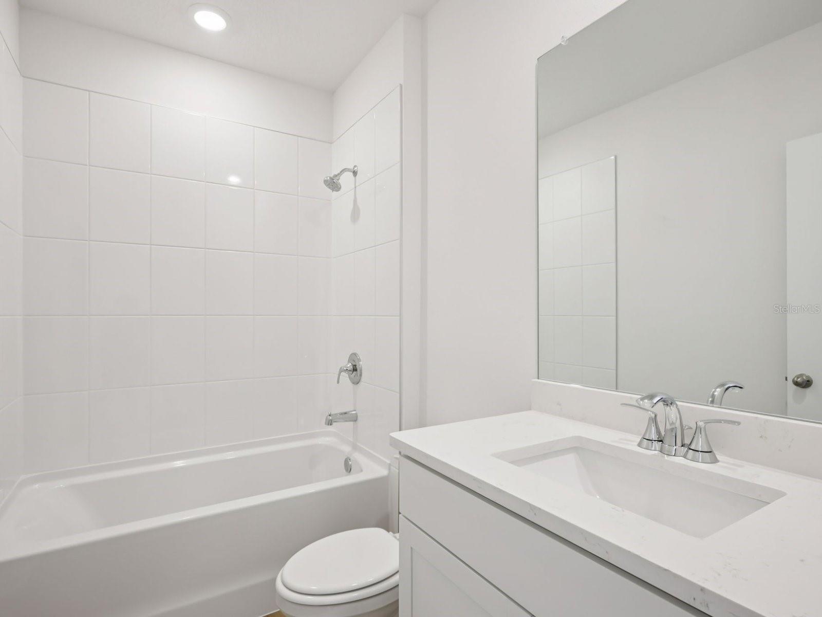 Interior photos are not of the actual home but are photos of the builder home with same floorplan with similar interior finishes and features.