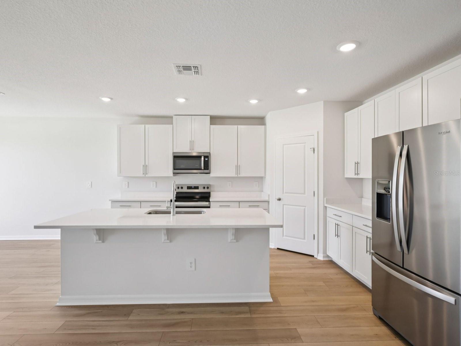 Interior photos are not of the actual home but are photos of the builder home with same floorplan with similar interior finishes and features.