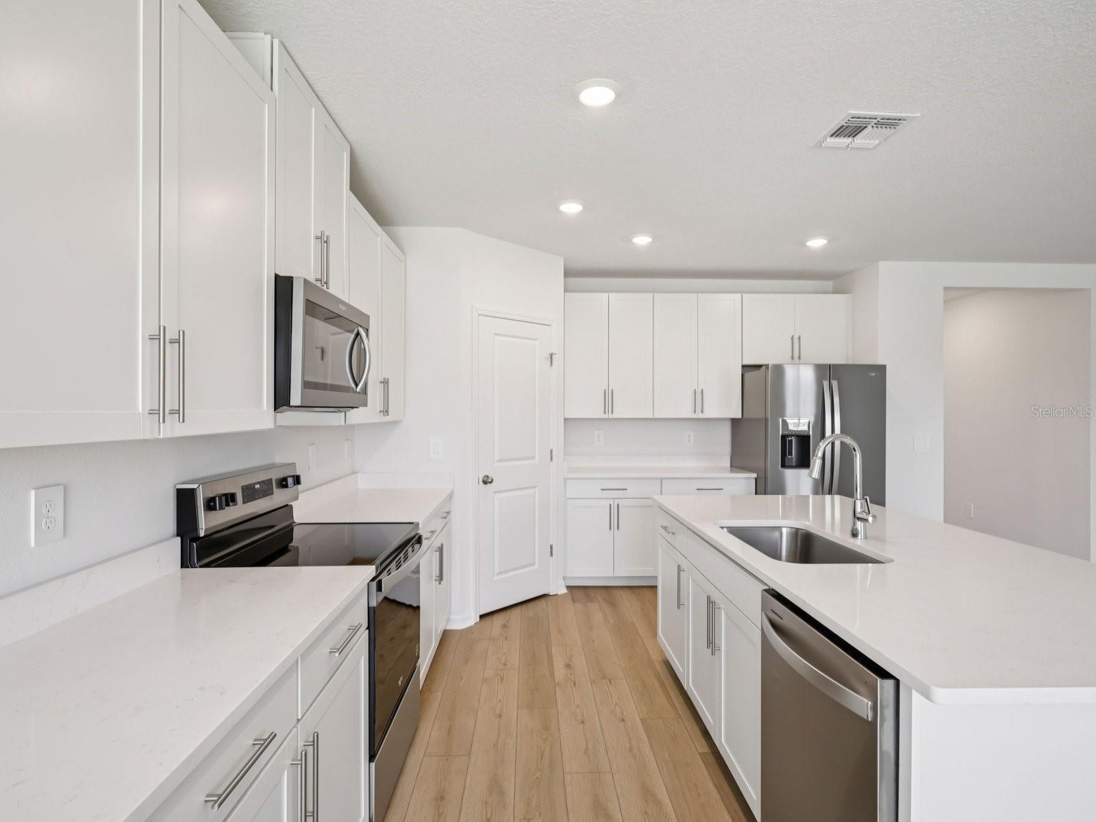 Interior photos are not of the actual home but are photos of the builder home with same floorplan with similar interior finishes and features.