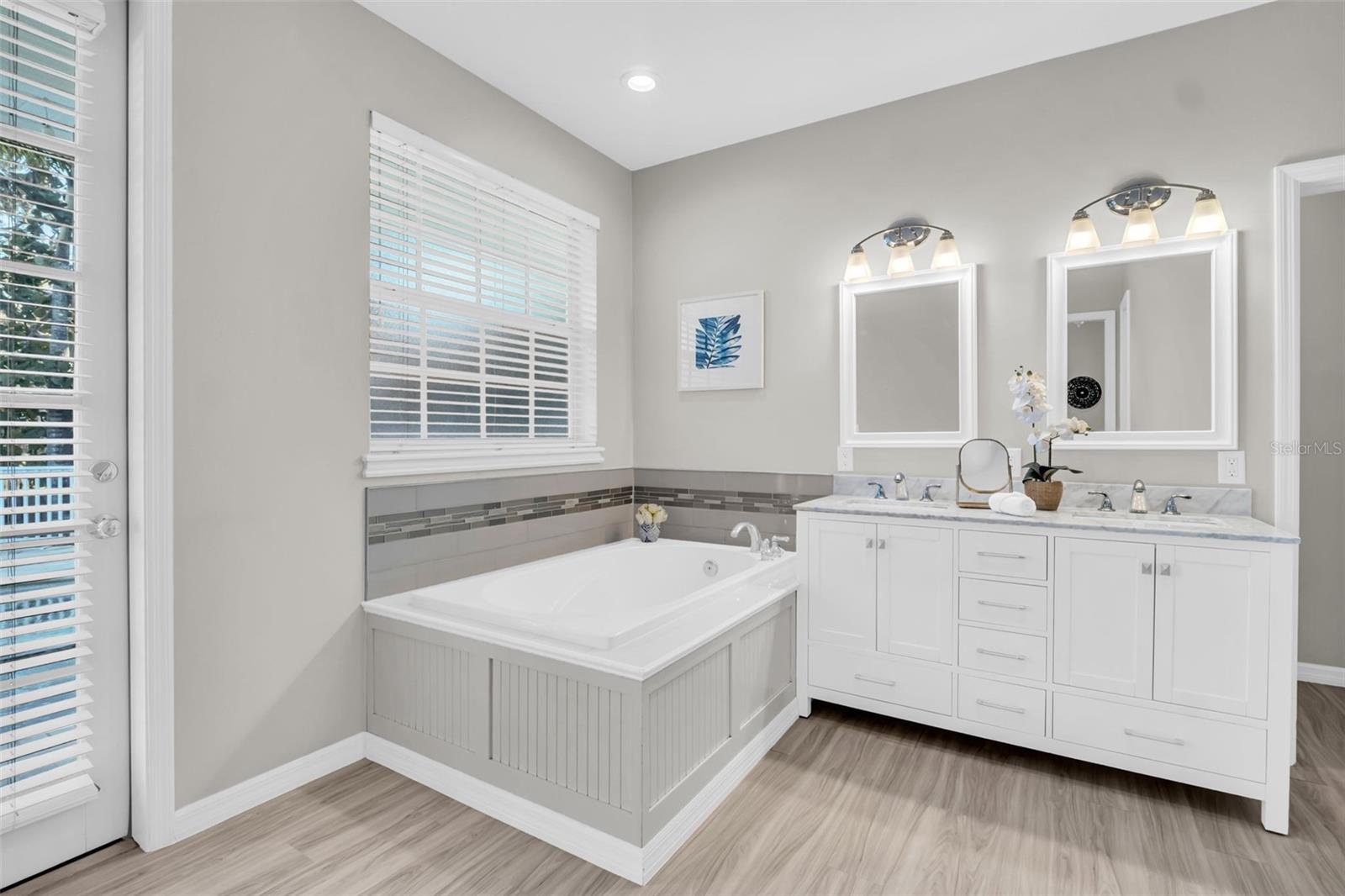 Oversized garden tub & quartz double vanity~