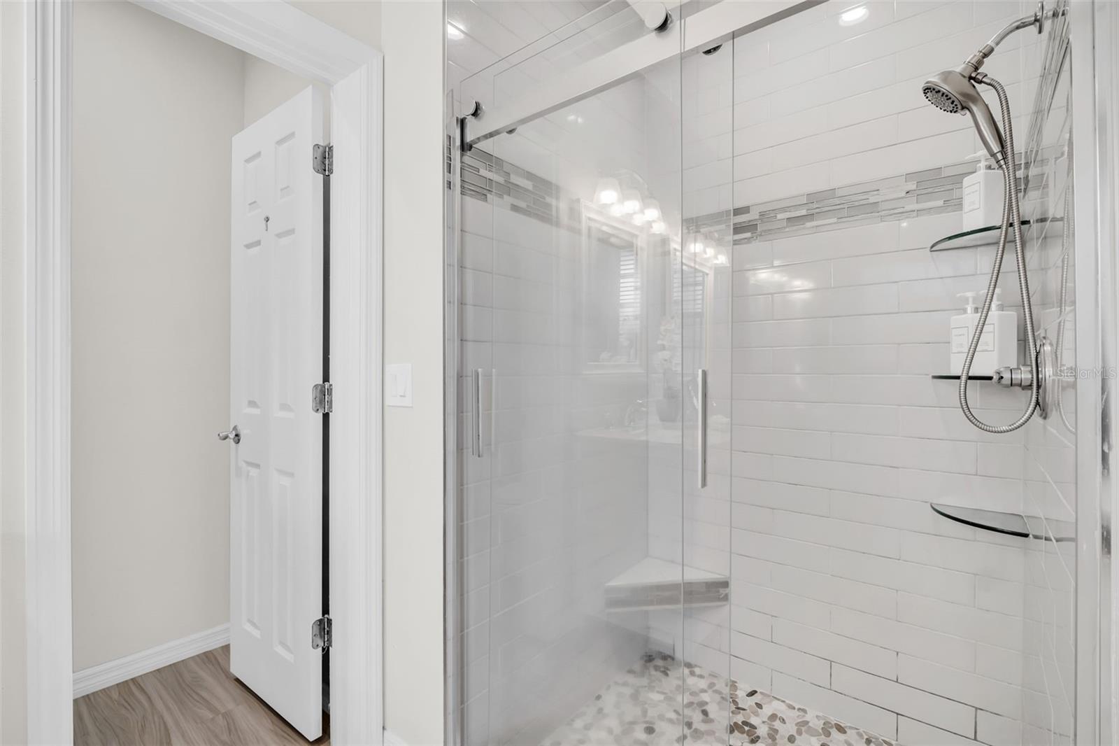 Beautifully updated glass walk-in shower~