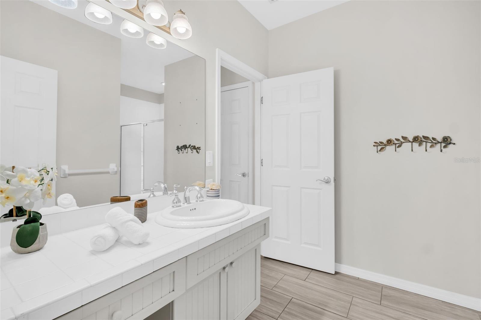 Bath also offers access to main living hallway for guests~