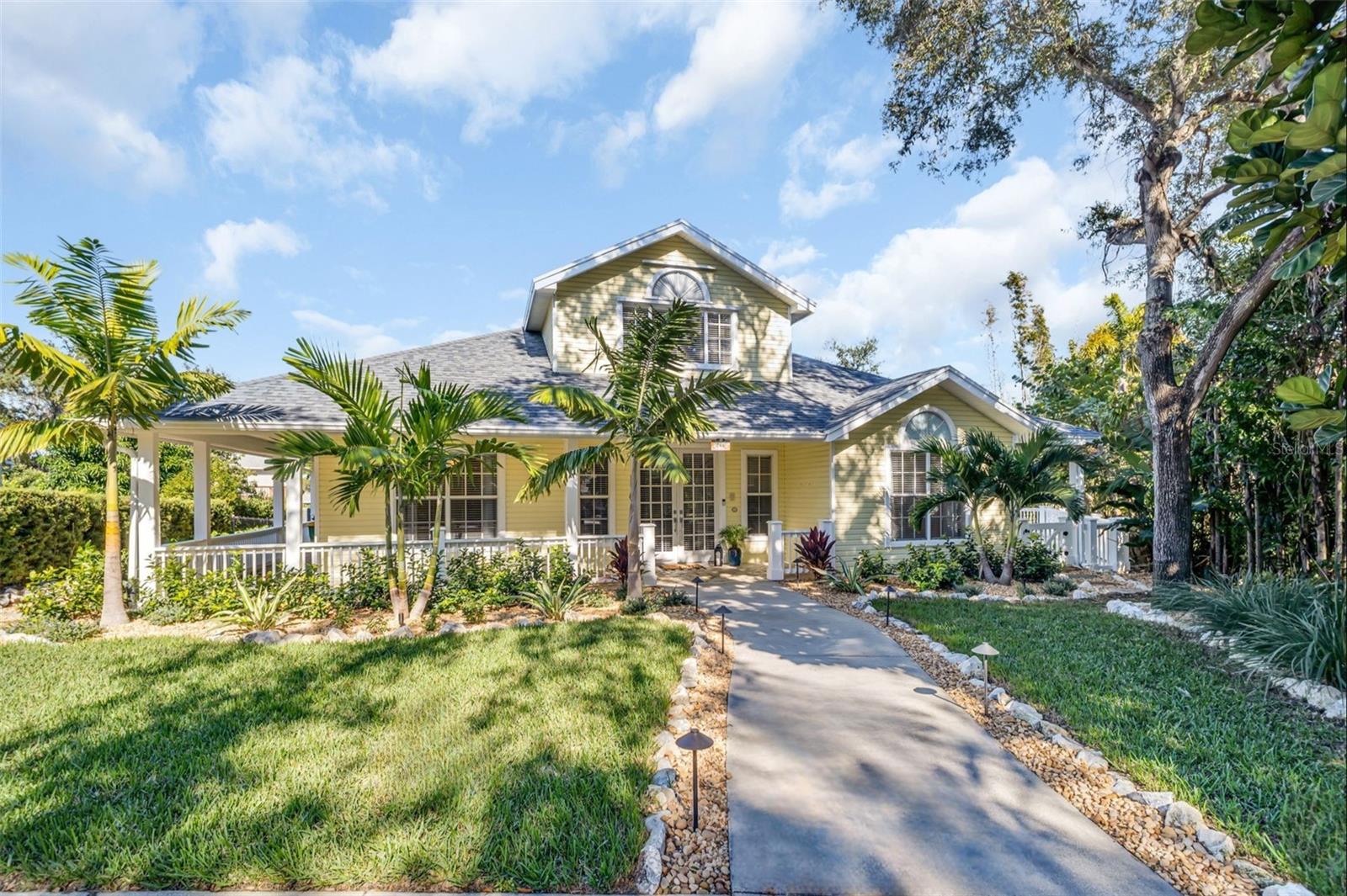 Front entry from quiet cul-de-sac with garage at the rear of home~