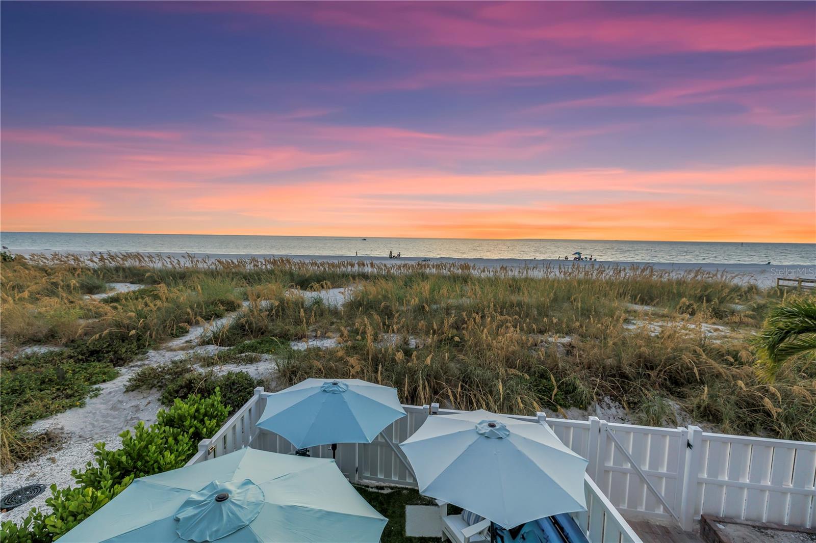 Enjoy breathtaking beachfront sunsets right from your private balcony.
