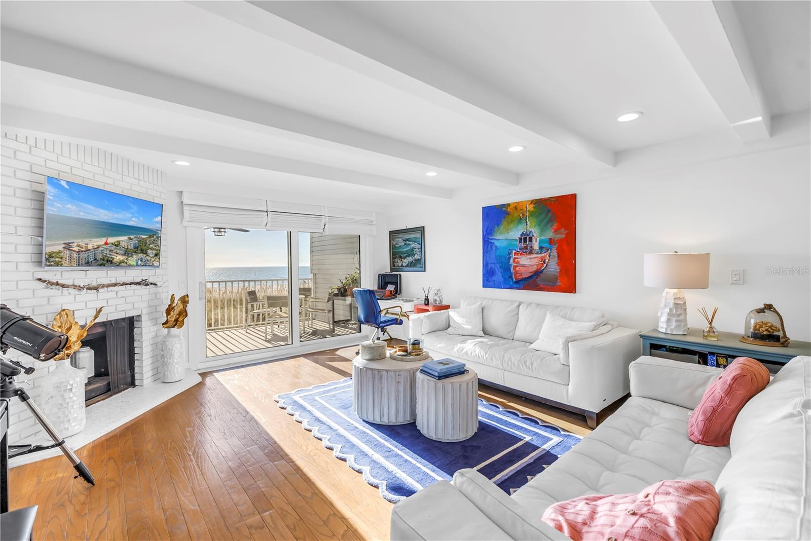 Brick, woodburning fireplace.