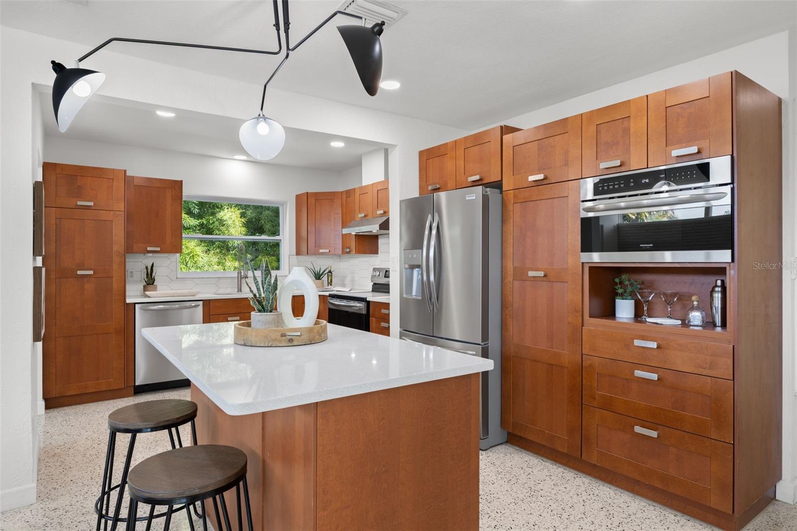 Update kitchen with custom cabinets and prep island