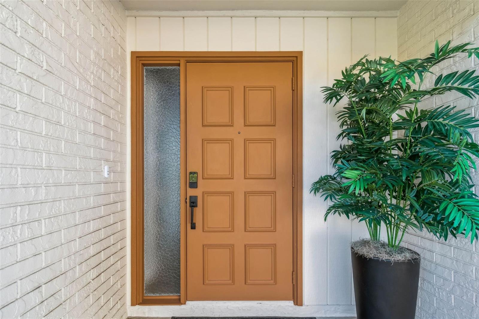 Gorgeous front door with wood beam