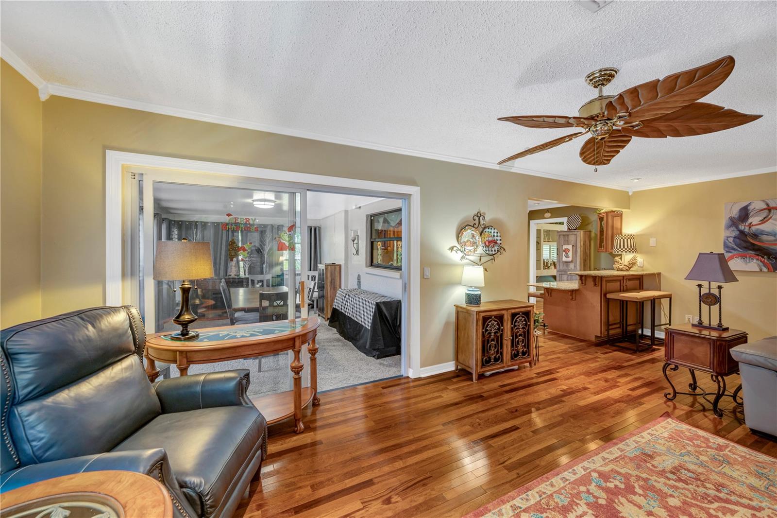 Living Room with view into enclosed Florida Room