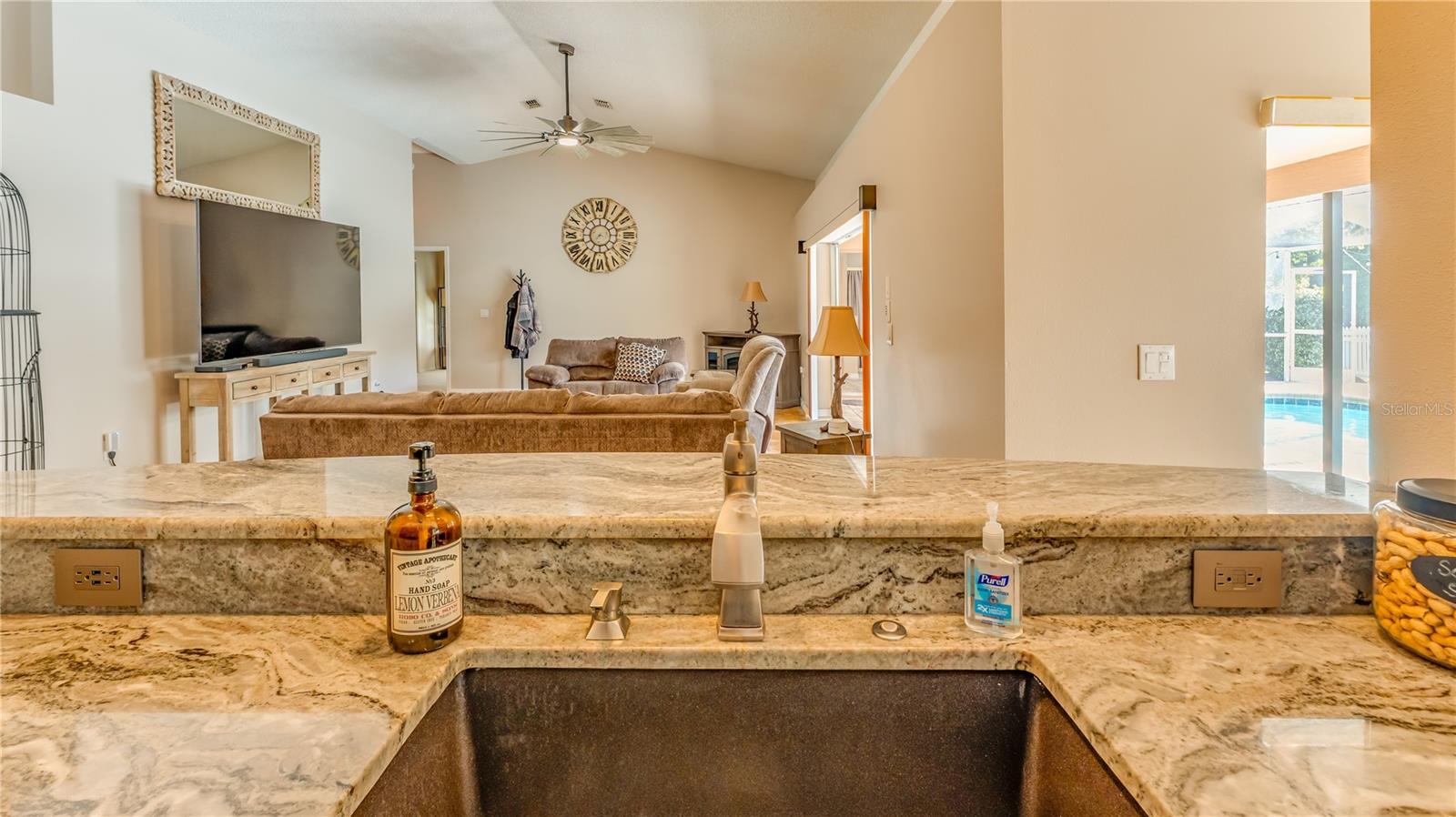 KITCHEN ISLAND OVERLOOKS THE GREAT ROOM